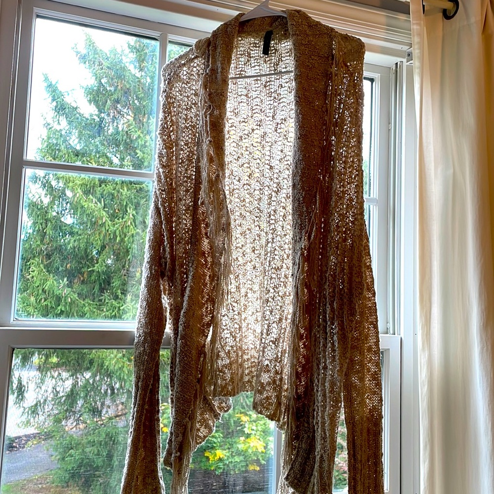 Beige cardigan with fringe detailing